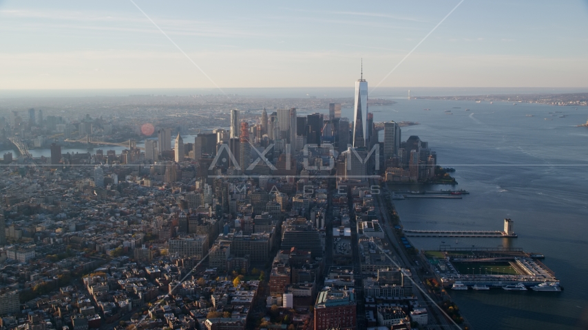 Lower Manhattan and piers on the Hudson at sunrise in New York City Aerial Stock Photo AX118_208.0000101F | Axiom Images