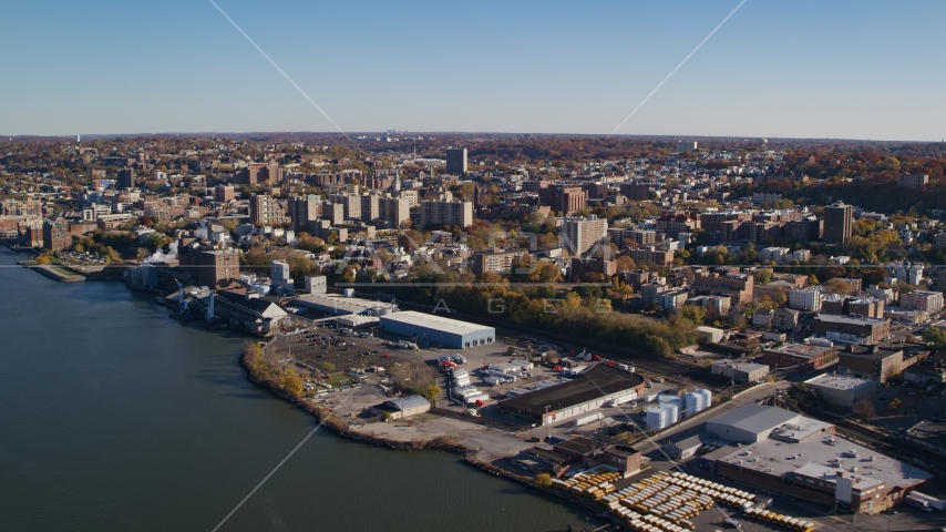 Riverfront warehouse buildings near downtown Yonkers, New York in Autumn Aerial Stock Photo AX119_063.0000143F | Axiom Images