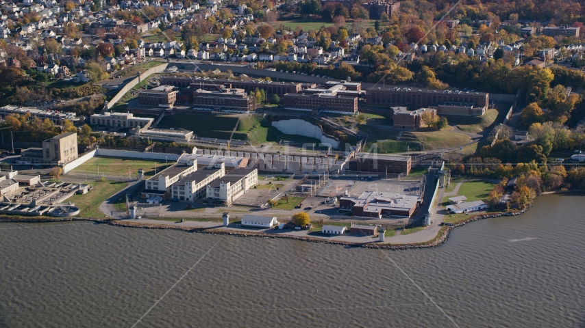 Sing Sing Prison by the Hudson River in Autumn, Ossining, New York Aerial Stock Photo AX119_122.0000128F | Axiom Images