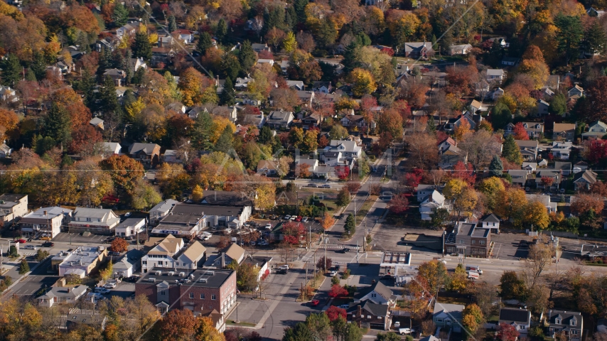 Small town homes around a street intersection in Autumn, Croton on Hudson, New York Aerial Stock Photo AX119_130.0000102F | Axiom Images