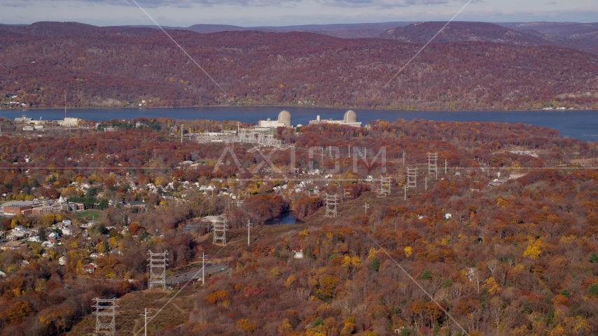 Power lines by the Indian Point Nuclear Power Plant in Autumn, Buchanan, New York Aerial Stock Photo AX119_140.0000056F | Axiom Images