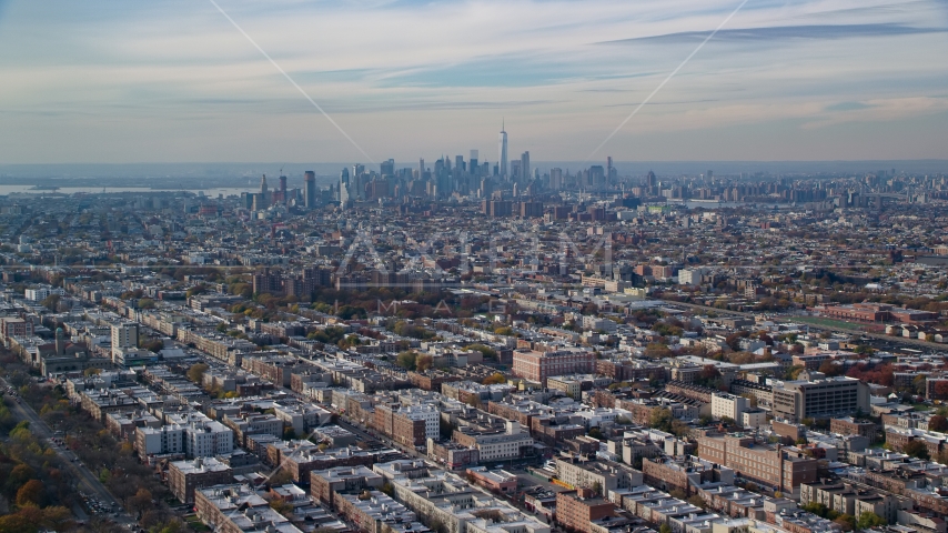 Lower Manhattan skyline seen from Brooklyn in Autumn, New York City Aerial Stock Photo AX120_080.0000094F | Axiom Images