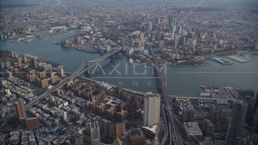 Brooklyn Bridge and Manhattan Bridge spanning the East River in New York City Aerial Stock Photo AX120_113.0000091F | Axiom Images