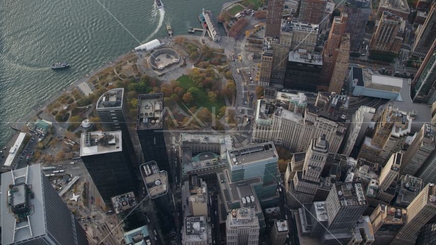 Bird's eye view of skyscrapers and Battery Park in Lower Manhattan, New York City Aerial Stock Photo AX120_118.0000185F | Axiom Images