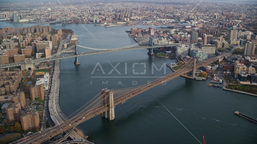 Manhattan and Brooklyn Bridges spanning the East River in New York City Aerial Stock Photo AX120_128.0000261F | Axiom Images