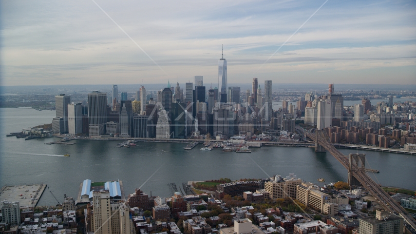 Lower Manhattan, the East River, and the Brooklyn Bridge in Autumn, New York City Aerial Stock Photo AX120_134.0000082F | Axiom Images