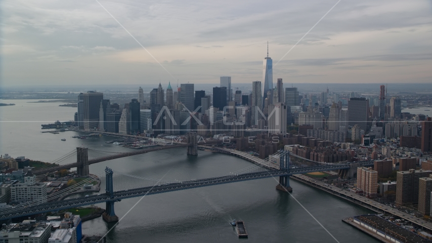 Manhattan Bridge, Brooklyn Bridge, East River, and Lower Manhattan, New York City Aerial Stock Photo AX120_143.0000065F | Axiom Images