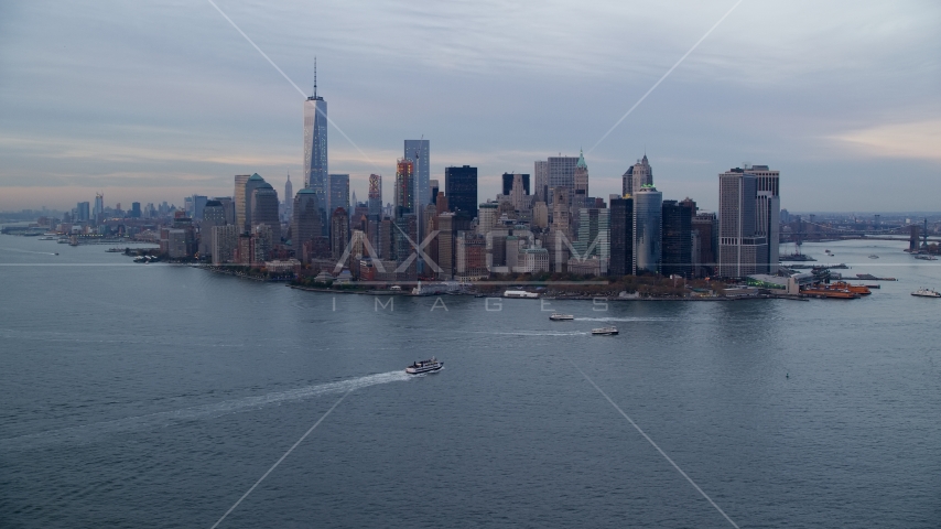 Battery Park and the Lower Manhattan skyline at Sunset, New York City Aerial Stock Photo AX121_017.0000111F | Axiom Images