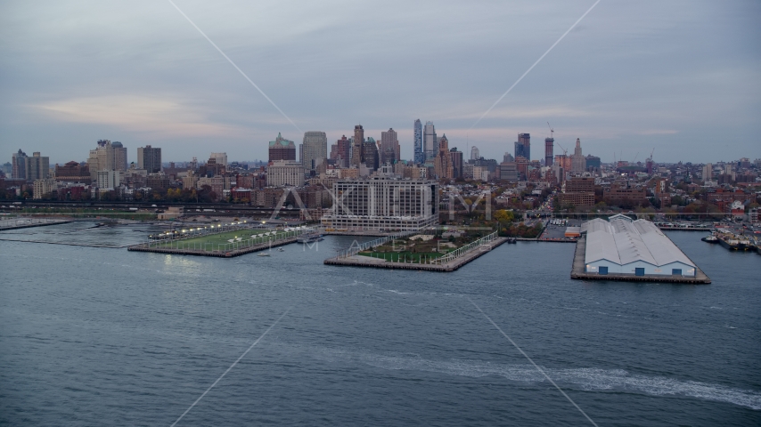 Piers 5 and 6 and Brooklyn skyline at sunset in New York City Aerial Stock Photo AX121_020.0000174F | Axiom Images