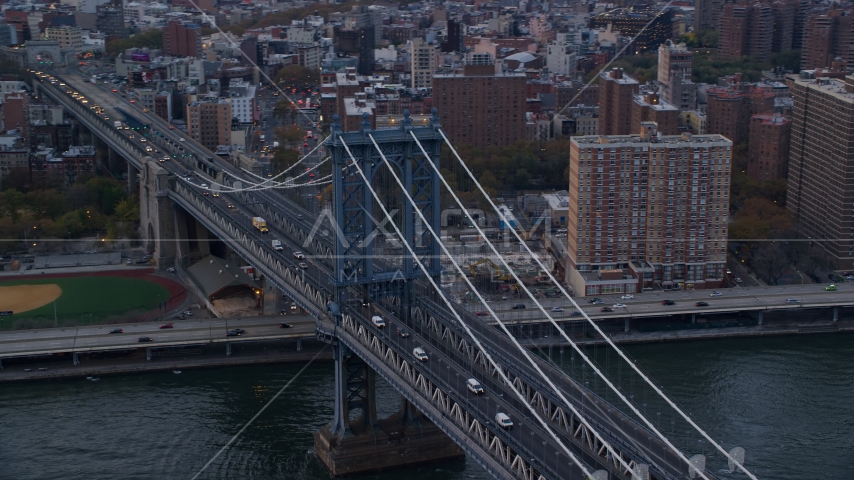 The Manhattan Bridge at sunset in New York City Aerial Stock Photo AX121_025.0000063F | Axiom Images