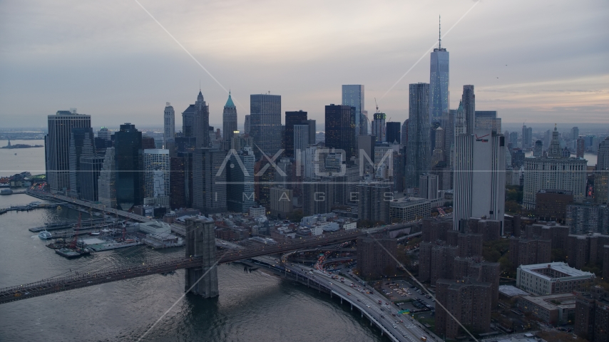 Lower Manhattan and the Brooklyn Bridge at sunset in New York City Aerial Stock Photo AX121_030.0000206F | Axiom Images