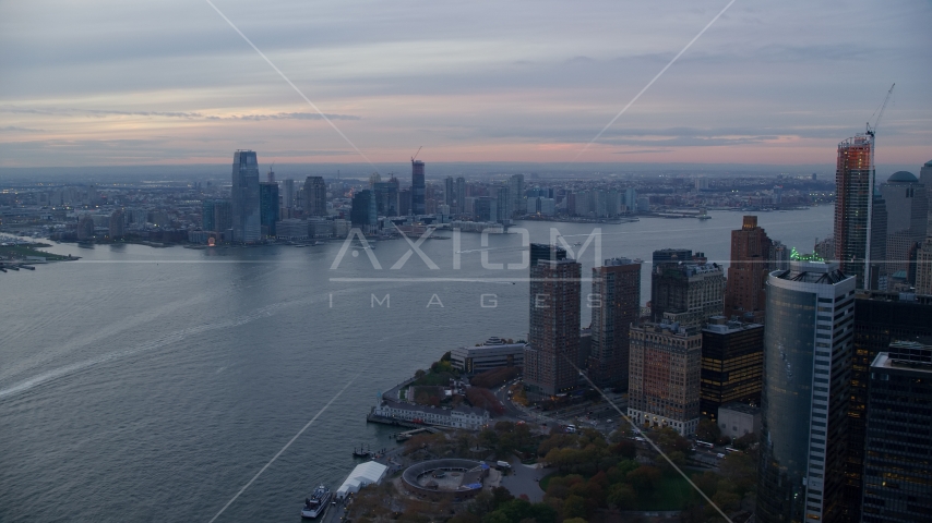 Downtown Jersey City at sunset seen from Lower Manhattan, New York City Aerial Stock Photo AX121_035.0000051F | Axiom Images