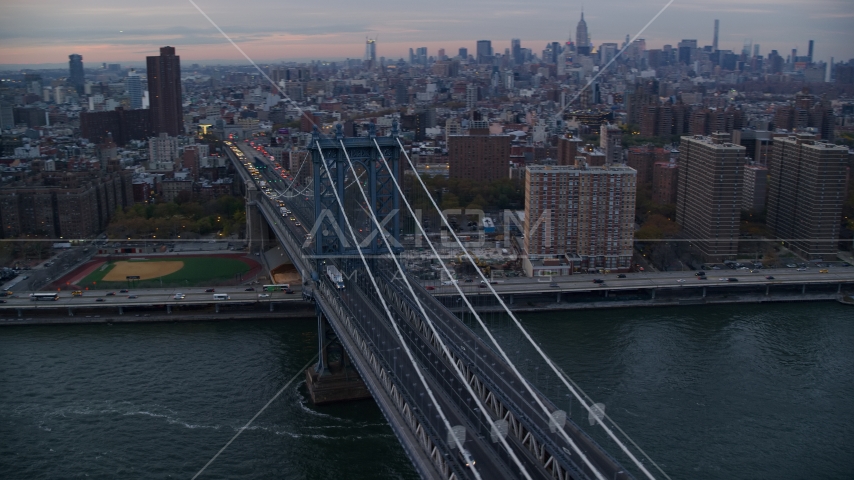 The Manhattan Bridge at sunset in New York City Aerial Stock Photo AX121_041.0000041F | Axiom Images