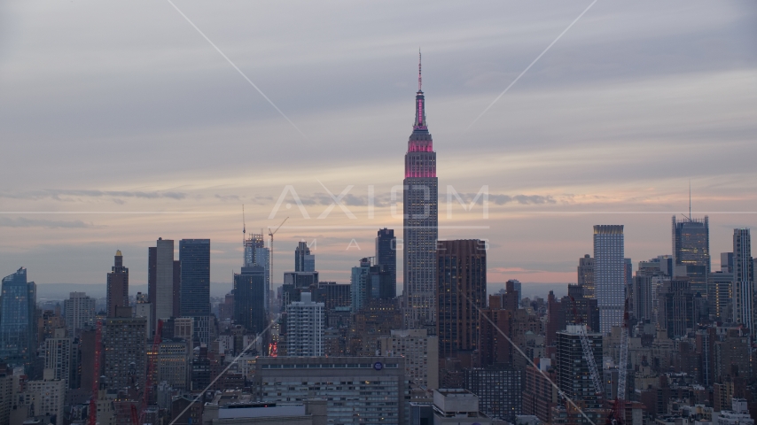 The Empire State Building at sunset in New York City Aerial Stock Photo AX121_050.0000054F | Axiom Images