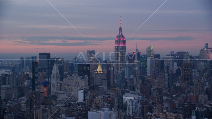 Empire State Building at Midtown high-rises at sunset in Midtown, New York City Aerial Stock Photo AX121_077.0000233F | Axiom Images