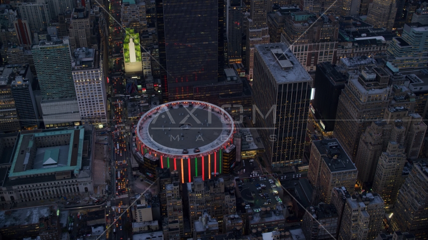 The Madison Square Garden arena at sunset in Midtown, New York City Aerial Stock Photo AX121_085.0000087F | Axiom Images