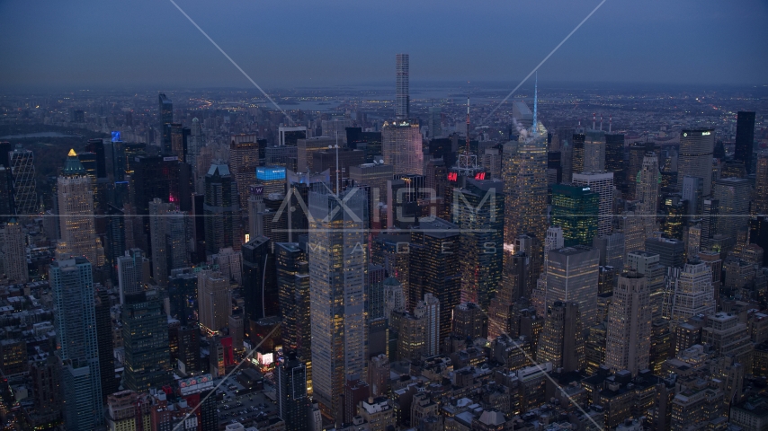 A group of Midtown skyscrapers at sunset in New York City Aerial Stock Photo AX121_087.0000092F | Axiom Images