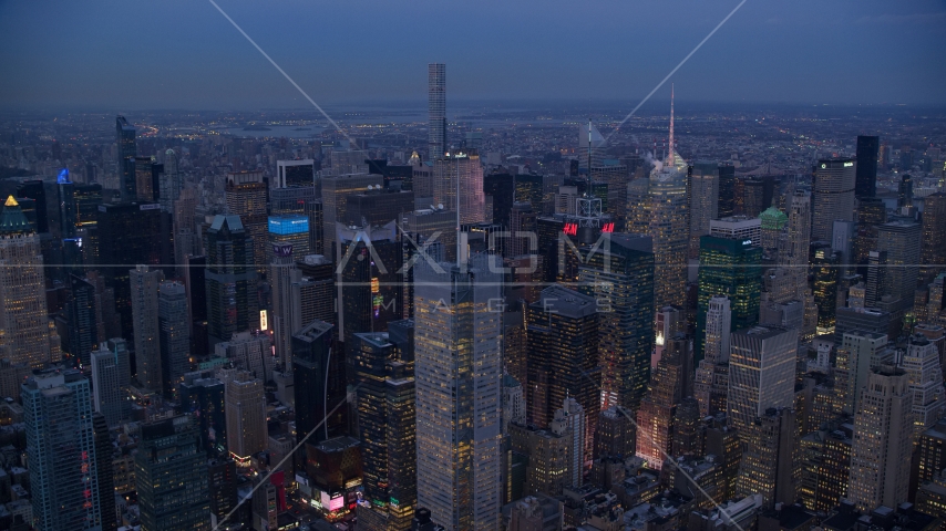 A group of tall Midtown skyscrapers at sunset in New York City Aerial Stock Photo AX121_087.0000257F | Axiom Images