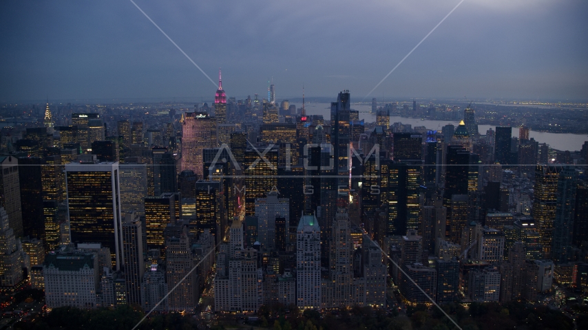 Tall Midtown Manhattan skyscrapers at sunset in New York City Aerial Stock Photo AX121_101.0000104F | Axiom Images