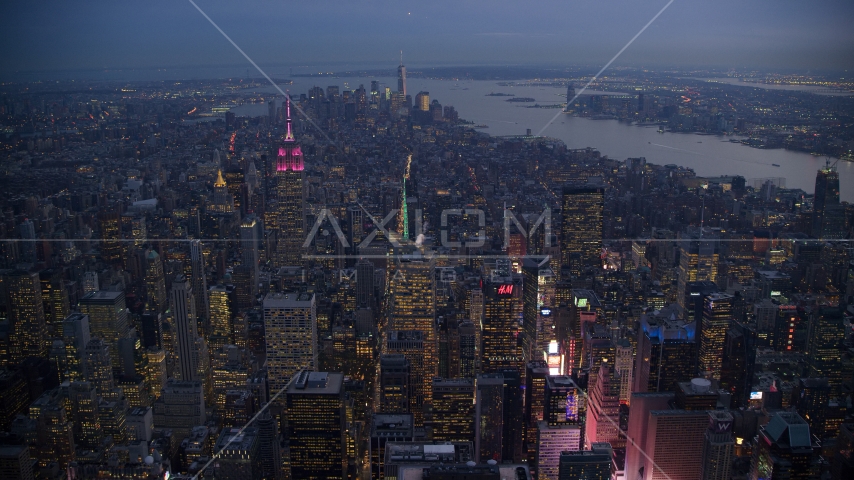 Lower Manhattan seen from Midtown near Times Square at sunset in New York City Aerial Stock Photo AX121_104.0000231F | Axiom Images