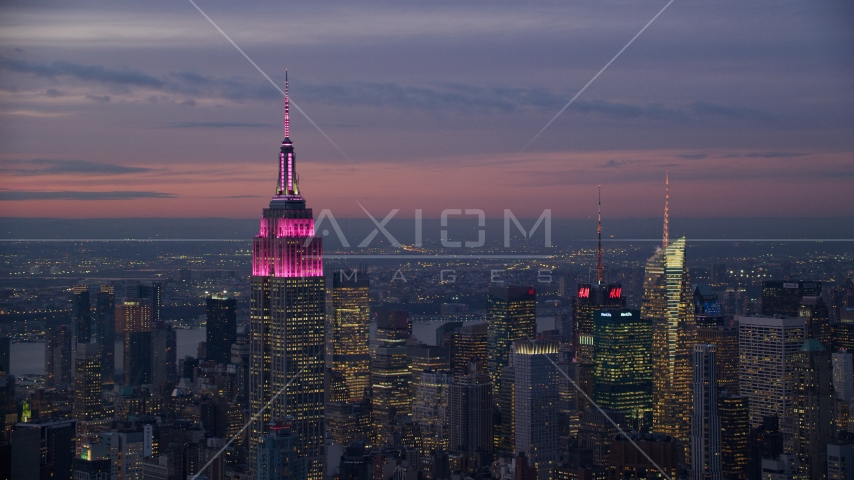 The Empire State Building at sunset in Midtown, New York City Aerial Stock Photo AX121_113.0000009F | Axiom Images