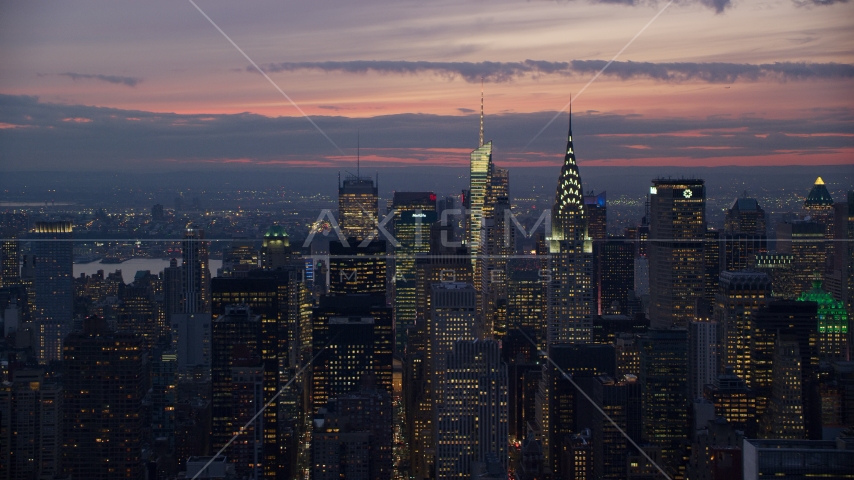 The Chrysler Building and Midtown Manhattan skyscrapers at sunset in New York City Aerial Stock Photo AX121_116.0000116F | Axiom Images