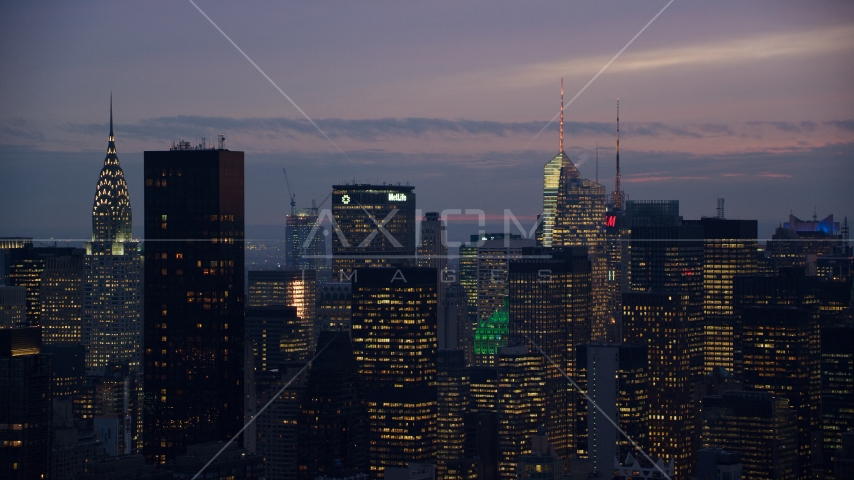 Tall Midtown skyscrapers at sunset in New York City Aerial Stock Photo AX121_118.0000045F | Axiom Images