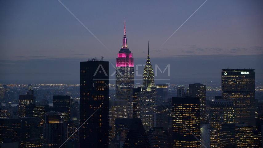 The Empire State and Chrysler Buildings at sunset in Midtown, New York City Aerial Stock Photo AX121_119.0000221F | Axiom Images