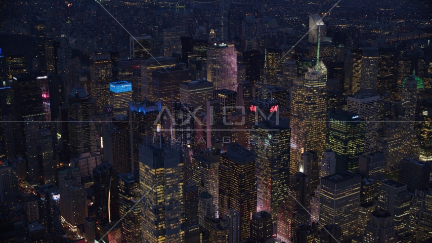Midtown Manhattan skyscrapers at night in New York City Aerial Stock Photo AX121_131.0000079F | Axiom Images