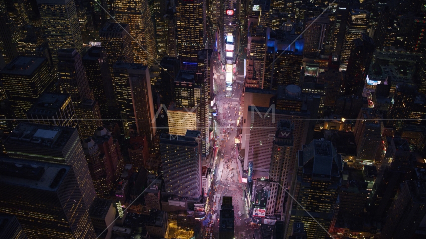 The bright lights of Times Square at night in Midtown, New York City Aerial Stock Photo AX121_135.0000081F | Axiom Images