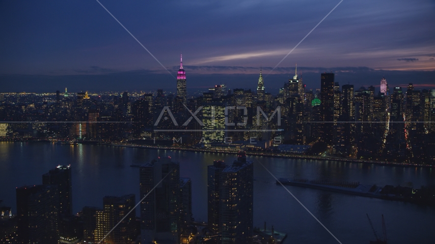 The UN Building and Midtown seen from Queens at night in New York City Aerial Stock Photo AX121_143.0000082F | Axiom Images