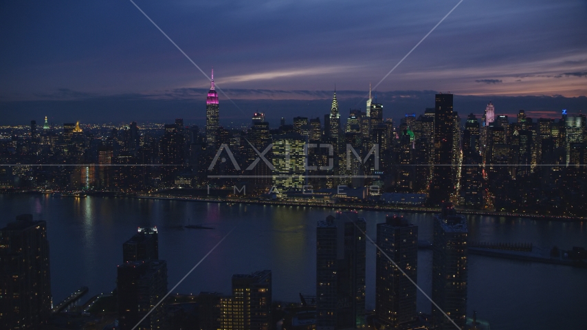 Midtown Manhattan seen from Queens at night in New York City Aerial Stock Photo AX121_143.0000231F | Axiom Images