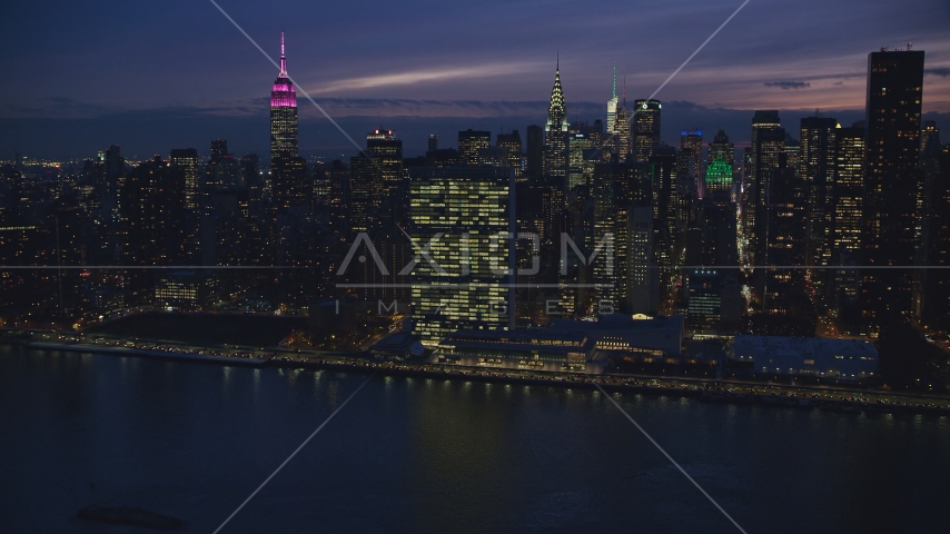 The UN Building in Midtown at night in New York City Aerial Stock Photo AX121_145.0000199F | Axiom Images