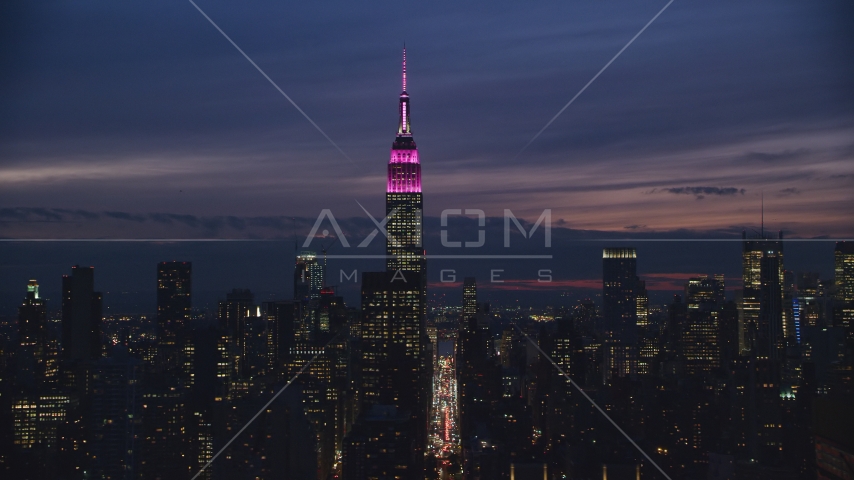 Empire State Building at night in Midtown Manhattan, NYC Aerial Stock Photo AX121_152.0000242F | Axiom Images