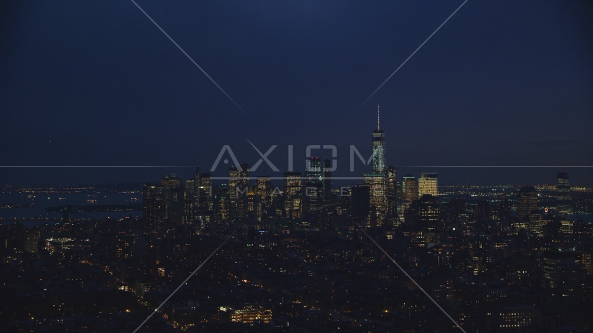 The Lower Manhattan skyline at night in New York City Aerial Stock Photo AX121_153.0000127F | Axiom Images