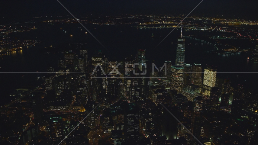 Skyscrapers of Lower Manhattan at night in New York City Aerial Stock Photo AX121_177.0000118F | Axiom Images