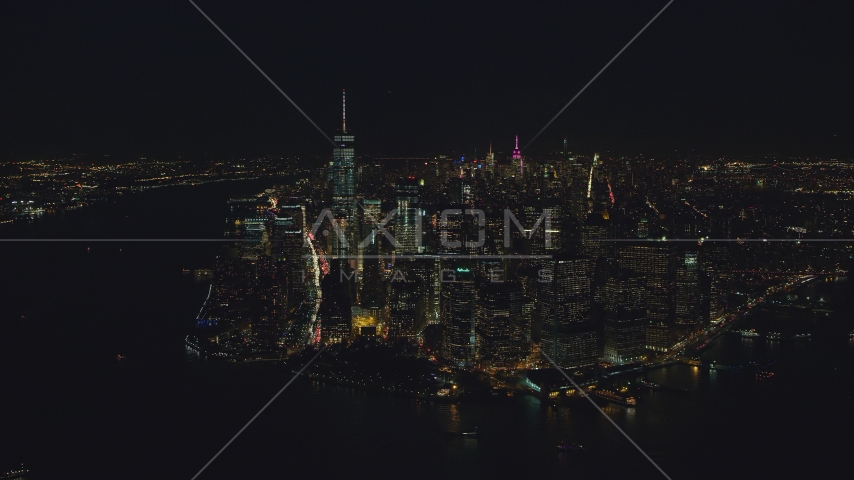 Lower Manhattan skyscrapers at night in New York City Aerial Stock Photo AX121_193.0000103F | Axiom Images