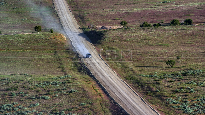 A silver SUV on Hatch Point Road in Moab, Utah Aerial Stock Photo AX138_223.0000000 | Axiom Images