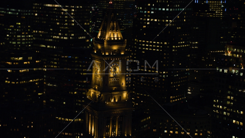 The top of Custom House Tower skyscraper in Downtown Boston, Massachusetts, night Aerial Stock Photo AX141_078.0000038 | Axiom Images