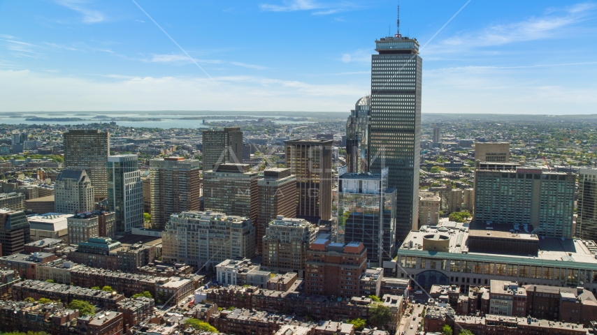 Prudential Tower skyscraper and city buildings, Downtown Boston, Massachusetts Aerial Stock Photo AX142_306.0000016 | Axiom Images