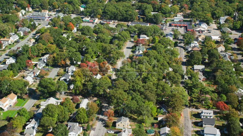 Small town neighborhood, trees in autumn, Randolph, Massachusetts Aerial Stock Photo AX143_005.0000000 | Axiom Images