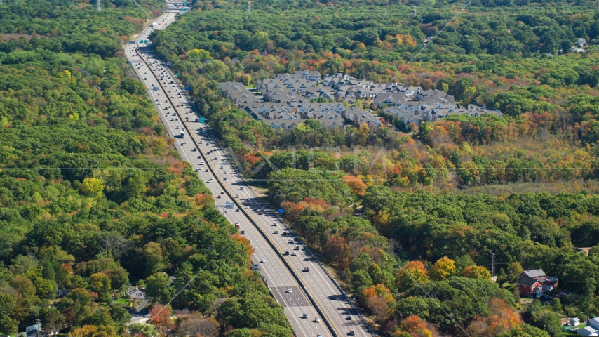 Pilgrims Highway and condominium complex in autumn, Braintree, Massachusetts Aerial Stock Photo AX143_010.0000094 | Axiom Images