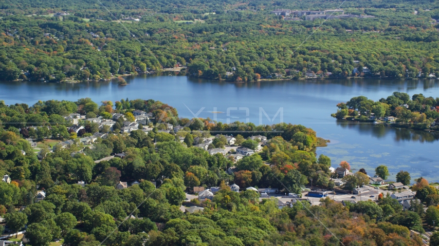 A small town by Whitmans Pond in autumn, Weymouth, Massachusetts Aerial Stock Photo AX143_014.0000107 | Axiom Images