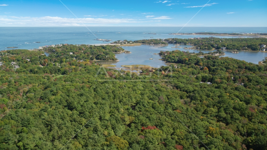 Forest and a small coastal community in autumn, Cohasset, Massachusetts Aerial Stock Photo AX143_024.0000262 | Axiom Images