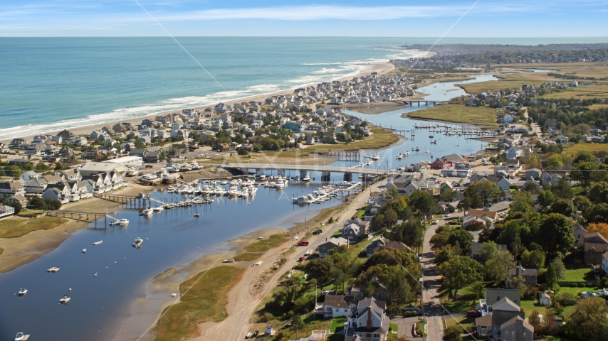 A small community between the coast and a small bridge spanning Broad Creek, Humarock, Massachusetts Aerial Stock Photo AX143_051.0000000 | Axiom Images