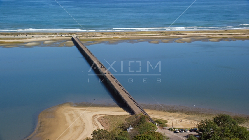 Two cars on the Powder Point Bridge in Duxbury, Massachusetts Aerial Stock Photo AX143_077.0000117 | Axiom Images