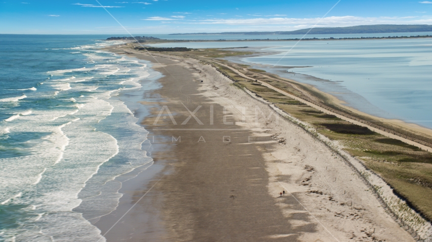 Waves rolling in on a beach, Duxbury, Massachusetts Aerial Stock Photo AX143_081.0000070 | Axiom Images