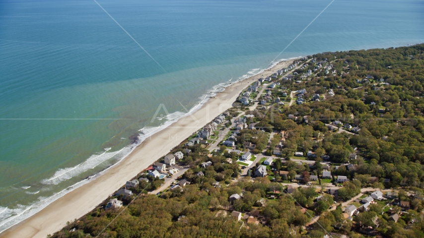 A small town with beachfront homes by Cape Cod Bay, Plymouth, Massachusetts Aerial Stock Photo AX143_122.0000000 | Axiom Images