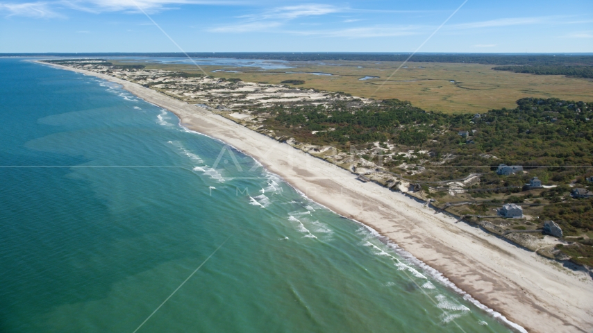 A stretch of beach with homes in Barnstable, Massachusetts Aerial Stock Photo AX143_131.0000105 | Axiom Images