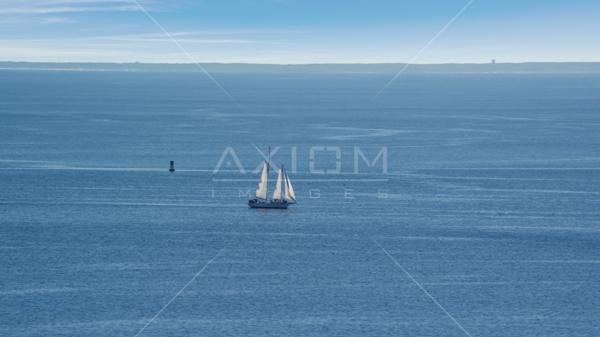 A sailing boat in Cape Cod Bay, Massachusetts Aerial Stock Photo AX143_220.0000000 | Axiom Images